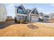 Charming two-story home with a two-car garage and well-maintained landscaping at 706 Tibumoll Ln, Fuquay Varina, NC 27526