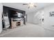 Comfortable living room with a media console and a flat-screen TV, creating a relaxing and inviting entertainment area at 706 Tibumoll Ln, Fuquay Varina, NC 27526