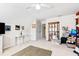 Attic bedroom features a neutral carpet, a ceiling fan, and a white desk at 712 Ledgerock Rd, Wake Forest, NC 27587