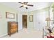 Bedroom featuring a ceiling fan, closet and windows that offer natural light at 712 Ledgerock Rd, Wake Forest, NC 27587