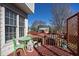 Cozy deck with green metal furniture offering neighborhood views at 712 Ledgerock Rd, Wake Forest, NC 27587