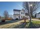 Beautiful two-story home boasts a manicured lawn, complemented by a welcoming front porch at 712 Ledgerock Rd, Wake Forest, NC 27587