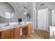 Bathroom showcasing double vanities, modern lighting, and a clean, well-maintained space at 804 Chancellors Ridge Dr, Durham, NC 27713