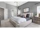 Primary bedroom featuring neutral colors, a plush bed, ensuite bathroom and lots of natural light at 804 Chancellors Ridge Dr, Durham, NC 27713