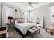 Serene bedroom with neutral tones, plush bedding, and ample natural light from multiple windows at 804 Chancellors Ridge Dr, Durham, NC 27713