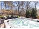 Relaxing hot tub in a private backyard setting, perfect for unwinding and enjoying the outdoors at 804 Chancellors Ridge Dr, Durham, NC 27713