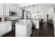 Spacious kitchen featuring stainless steel appliances and center island open to living room at 804 Chancellors Ridge Dr, Durham, NC 27713