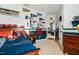 Comfortable bedroom with pennant decorations, athletic sports items, and warm wood furniture at 812 Long Meadows Rd, Chapel Hill, NC 27516