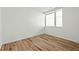 Bedroom showcasing hardwood floors, light walls, and a well-lit atmosphere at 813 N Mangum St, Durham, NC 27701