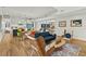 Spacious living area with a modern kitchen, dining area, and comfortable seating at 813 N Mangum St, Durham, NC 27701