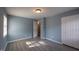 Bright bedroom features wood look flooring, fresh paint, and natural light at 817 S Brake St, Nashville, NC 27856