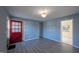 Cozy living room featuring newly installed laminate floors and fresh paint at 817 S Brake St, Nashville, NC 27856