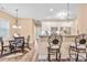 Eat-in kitchen features granite counters, a breakfast bar, and stainless appliances at 86 Pappy Ln, Garner, NC 27529