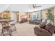 Living room featuring a leather sofa, bar table, and ample space for relaxation and entertainment at 86 Pappy Ln, Garner, NC 27529