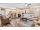 Cozy living room with open floor plan and a stylish rug beneath a white sofa at 86 Pappy Ln, Garner, NC 27529