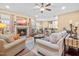 Inviting living room featuring a stone fireplace, comfortable seating, and an open layout at 86 Pappy Ln, Garner, NC 27529