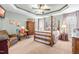Cozy bedroom with a four-poster bed, tray ceiling, and neutral decor at 86 Pappy Ln, Garner, NC 27529