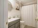 Bathroom featuring a shower, a toilet, and a vanity at 8600 Paddle Wheel Dr, Raleigh, NC 27615