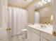 Bathroom with shower/tub combo and a vanity with a mirror at 8600 Paddle Wheel Dr, Raleigh, NC 27615