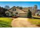 Lovely suburban home with attached two-car garage and well-maintained landscaping at 8600 Paddle Wheel Dr, Raleigh, NC 27615