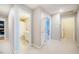 Hallway features multiple doorways, including one leading to a bathroom at 8600 Paddle Wheel Dr, Raleigh, NC 27615