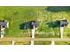 Aerial view of a newly built home with long driveway on a large lot in a rural community at 9315 Turkey Way, Middlesex, NC 27557