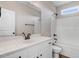 Bathroom with double vanity, white cabinets, tile floors and shower/tub combo at 9315 Turkey Way, Middlesex, NC 27557