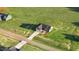 Elevated view of single Gathering home with attached garage on large lot with concrete driveway at 9315 Turkey Way, Middlesex, NC 27557