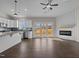 Modern kitchen featuring stainless appliances, island, and tiled backsplash at 9315 Turkey Way, Middlesex, NC 27557