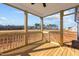 The wooden-floored patio provides a perfect place to relax and enjoy expansive views of the yard at 9315 Turkey Way, Middlesex, NC 27557