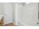 Bathroom area featuring neutral paint, a tub shower combination with a sliding door at 938 Widewaters Pkwy, Knightdale, NC 27545