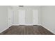 Bedroom with hard surface floors and white doors at 938 Widewaters Pkwy, Knightdale, NC 27545