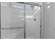 Shower showcasing a sleek sliding glass door and modern fixtures at 95 Westbrook Ln, Franklinton, NC 27525
