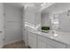 Bathroom featuring double sink vanity with great lighting and decorative grass at 95 Westbrook Ln, Franklinton, NC 27525