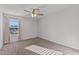 Bright carpeted bedroom featuring standard window providing lots of sunlight at 95 Westbrook Ln, Franklinton, NC 27525