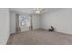 Bright bedroom with large window allowing natural light to illuminate the carpeted floor at 95 Westbrook Ln, Franklinton, NC 27525