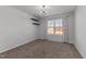 Bedroom with shelves, carpet flooring, standard window and chandelier lighting at 95 Westbrook Ln, Franklinton, NC 27525