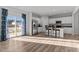 Modern kitchen featuring stainless steel appliances, granite countertops, and a breakfast bar with stylish seating at 95 Westbrook Ln, Franklinton, NC 27525