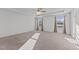 Spacious main bedroom with plush carpeting, tray ceiling and dual windows at 95 Westbrook Ln, Franklinton, NC 27525