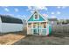Playhouse featuring a porch with railing and star-shaped details at 95 Westbrook Ln, Franklinton, NC 27525