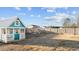 Charming playhouse with a porch, window and white trim at 95 Westbrook Ln, Franklinton, NC 27525