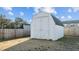 Outdoor white storage shed featuring double barn doors at 95 Westbrook Ln, Franklinton, NC 27525