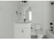 A modern bathroom features a vanity with mirror and a toilet at 100 Sire Ct, Holly Springs, NC 27540