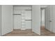 Spacious walk-in closet with built-in shelving and hanging rods for ample storage at 100 Sire Ct, Holly Springs, NC 27540