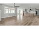 Open-concept living room flows into the kitchen area at 100 Sire Ct, Holly Springs, NC 27540