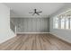 Spacious living room with hardwood floors and plenty of natural light at 100 Sire Ct, Holly Springs, NC 27540
