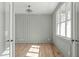 Bright office with large window, stylish trim, and hardwood floors at 100 Sire Ct, Holly Springs, NC 27540