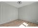 Stylish office with hardwood floors, wainscoting, and modern lighting at 100 Sire Ct, Holly Springs, NC 27540