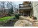 Beautiful backyard with stone walkway, multiple decks and patios offer a place to gather at 1004 Colworth Way, Raleigh, NC 27614