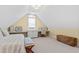 Bedroom with vaulted ceiling, built-in desk, and ample natural light, ideal for a home office at 1004 Colworth Way, Raleigh, NC 27614